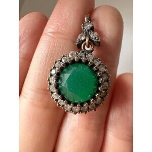 Sterling silver treated emerald pendant